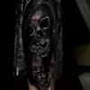 Skull-Rabe-Tattoo