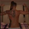 Trained back with mixed Tattoos